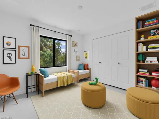 Bedroom with a closet and baseboards