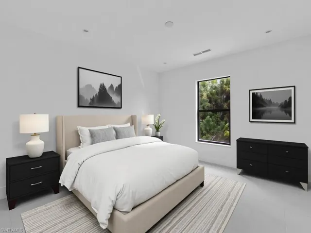 Bedroom featuring light tile patterned floors and recessed lighting