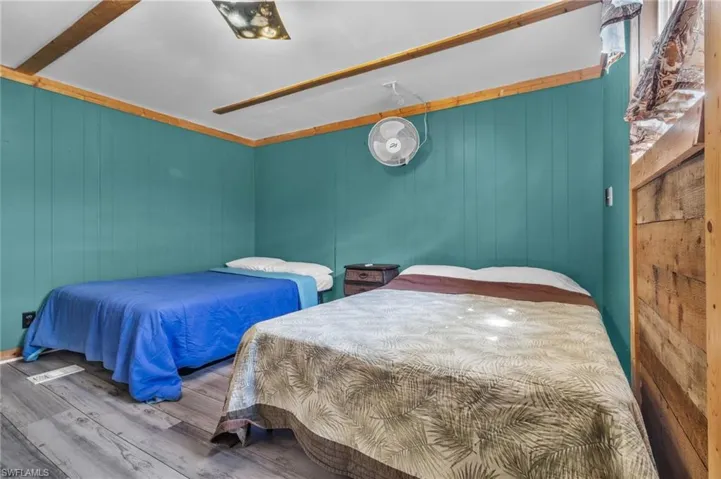 Bedroom featuring wood finished floors