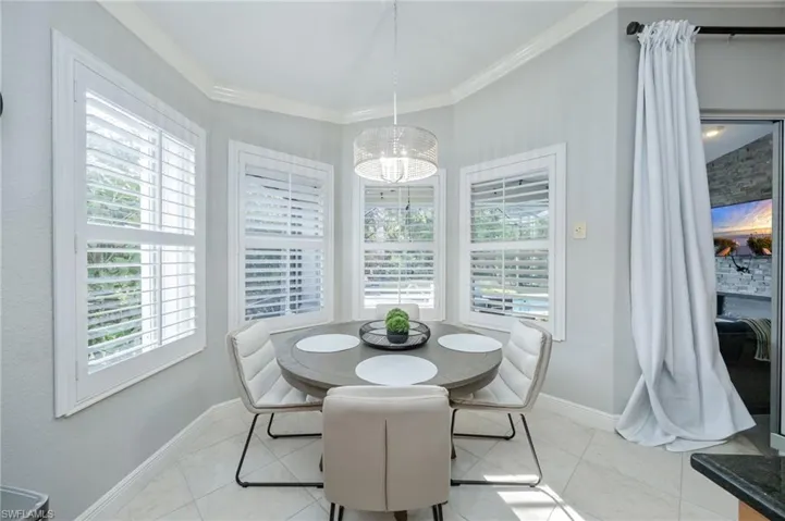 Dining room featuring crown molding