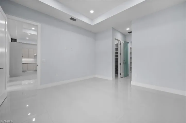 Spare room with recessed lighting and tile patterned flooring