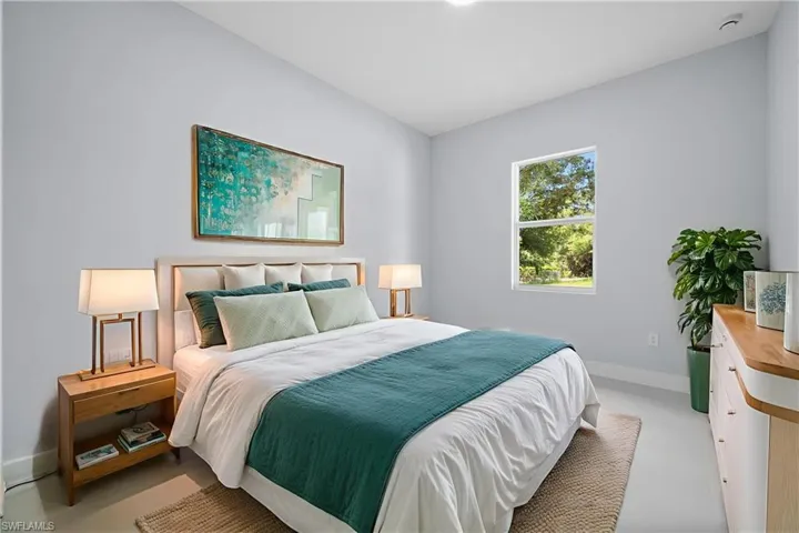 Bedroom featuring baseboards