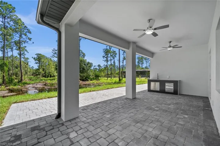 View of patio with ceiling fan