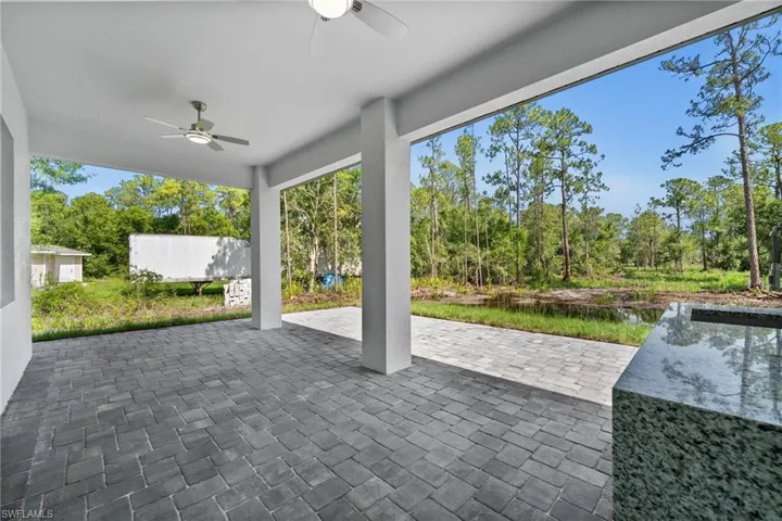 View of patio / terrace featuring a ceiling fan
