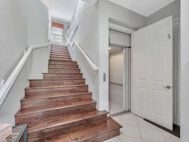 You have the choice of the beautiful staircase or private elevator