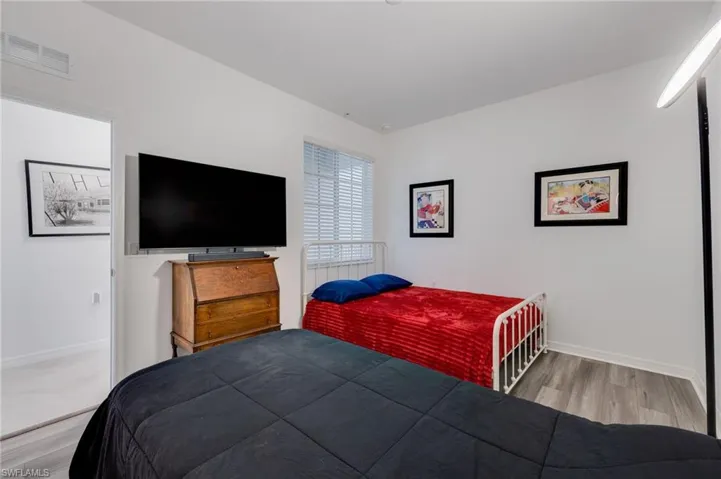 Bedroom featuring light wood-type flooring