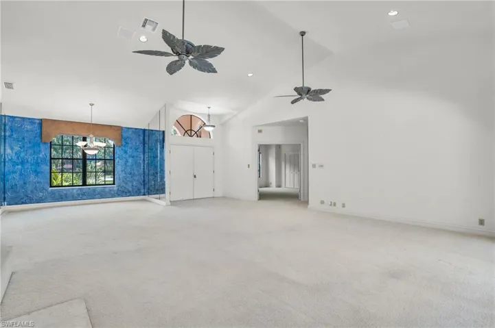 Living room with sliding doors to pool