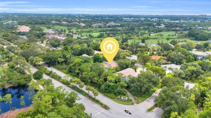 Aerial view of home and neighborhood views