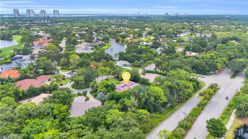 Aerial view of home and Bonita Bay skyline