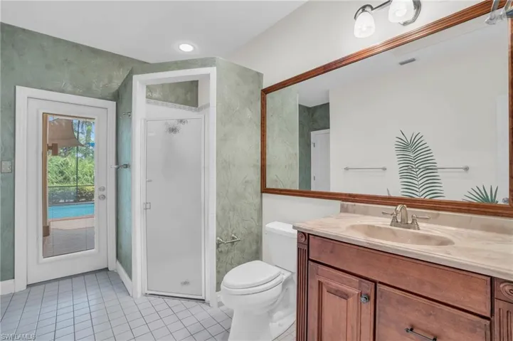 Ensuite bathroom with walk-in shower and elegant finishes