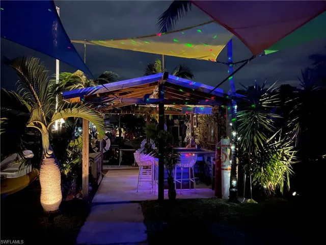 Photo of bar in the backyard at night taken prior to Hurricane Ian