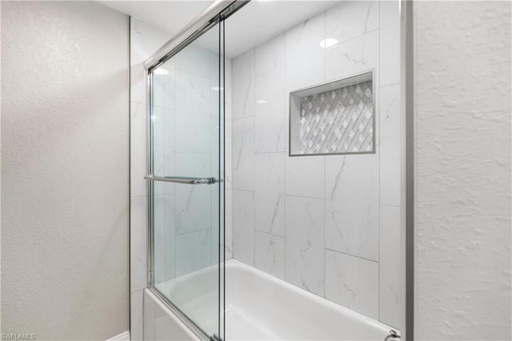 Tub with shower doors perfect for children