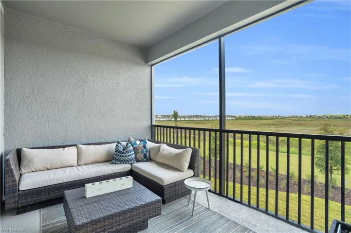 Sunroom / solarium featuring an outdoor living space