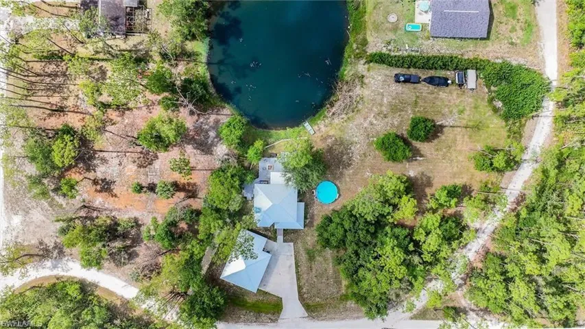 Aerial view of a large body of water and a pool