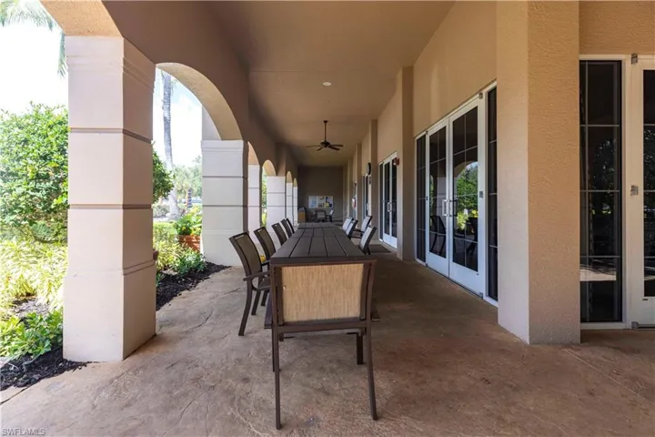 View of patio / terrace with outdoor dining space and a ceiling fan
