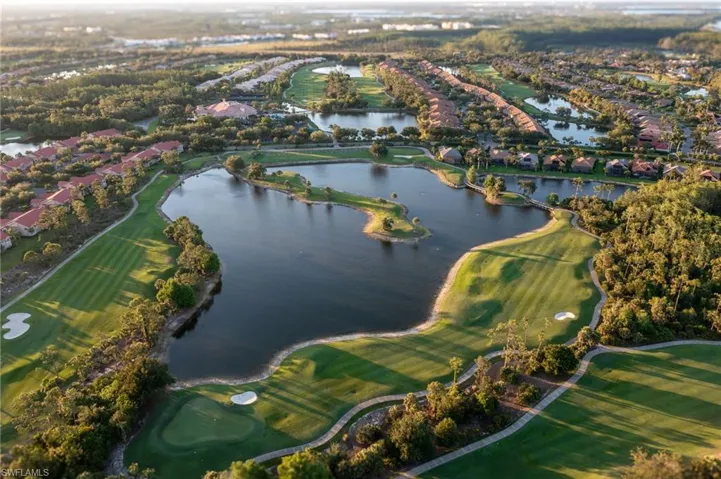 Aerial overview of property's location with a local golf course and nearby suburban area