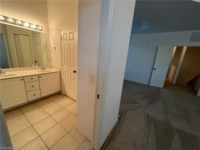 ensuite master bathroom with separate toilet