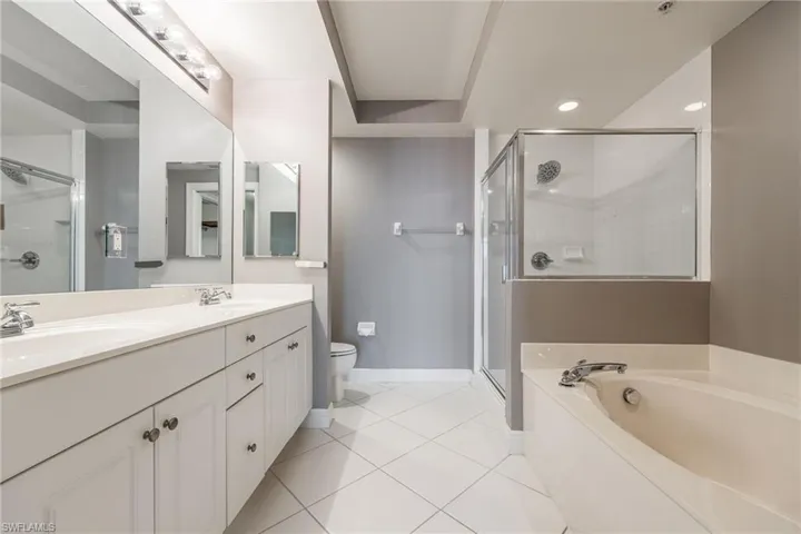 Primary Bathroom with walk-in shower and soaking tub