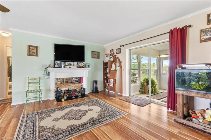 Family Room w/ access to enclosed lanai