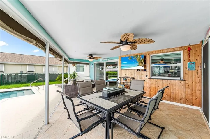 Patio featuring ceiling fans