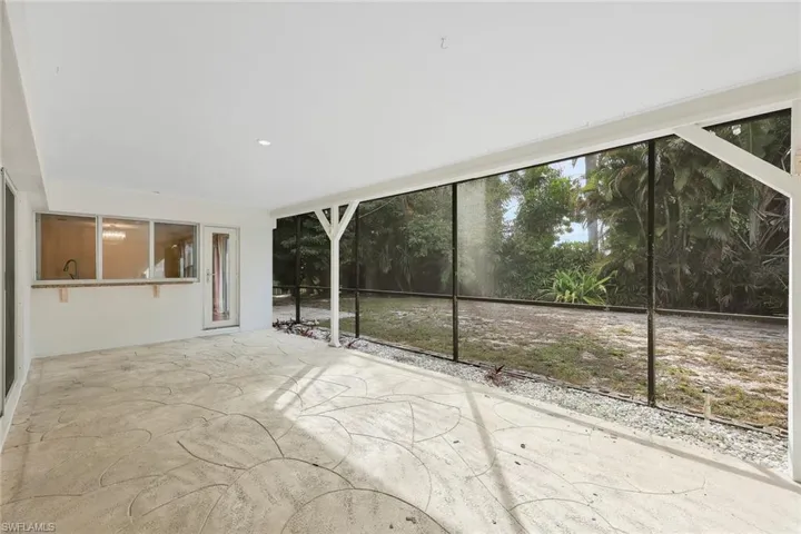 Unfurnished sunroom featuring plenty of natural light