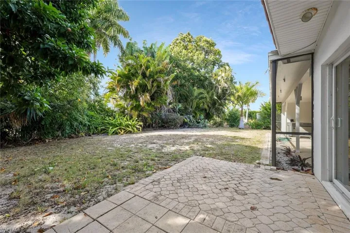 View of yard with a patio area
