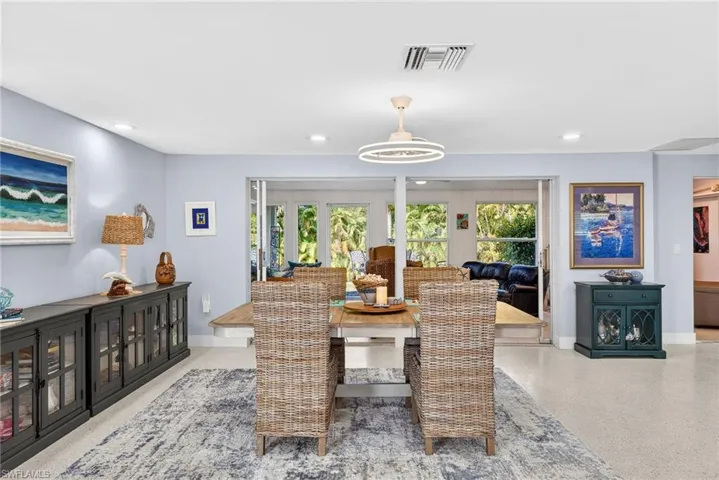 Dining area featuring plenty of natural light and recessed lighting