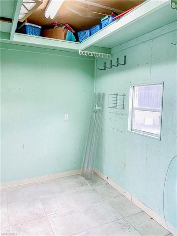 Large storage shed off pool area and carport with extra bathroom area