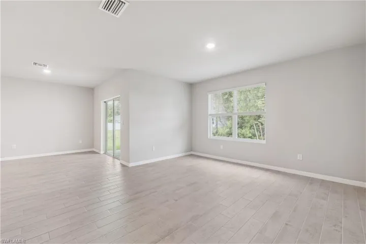 Empty room featuring light hardwood / wood-style floors