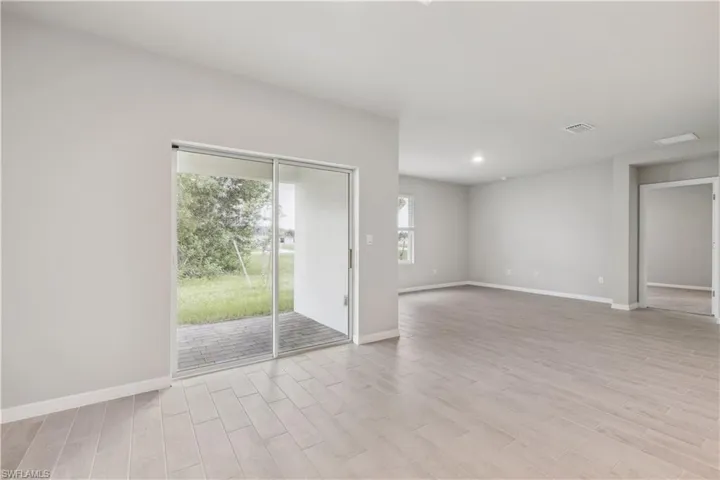 Empty room featuring light hardwood / wood-style flooring