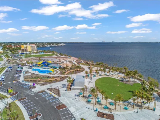 Bird's eye view of a pool and a large body of water