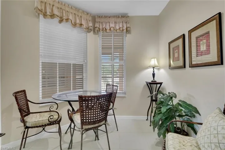 Dining room with baseboards and tile patterned floors