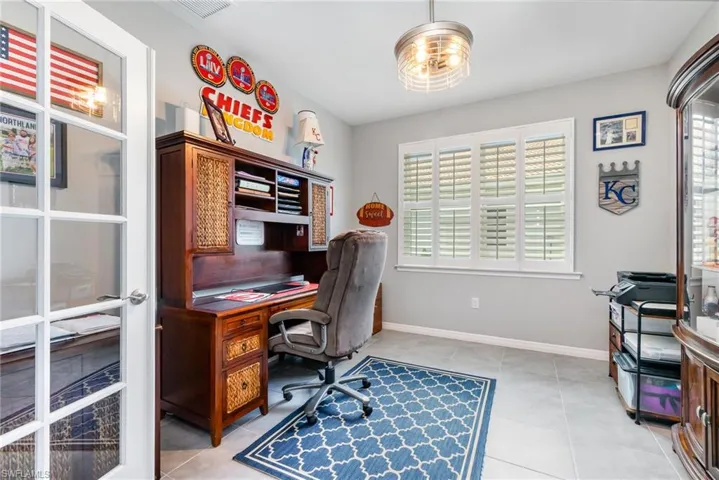 Office space featuring light tile patterned floors