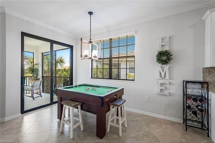Casual Dining Area with Sliding Glass Doors to Lanai