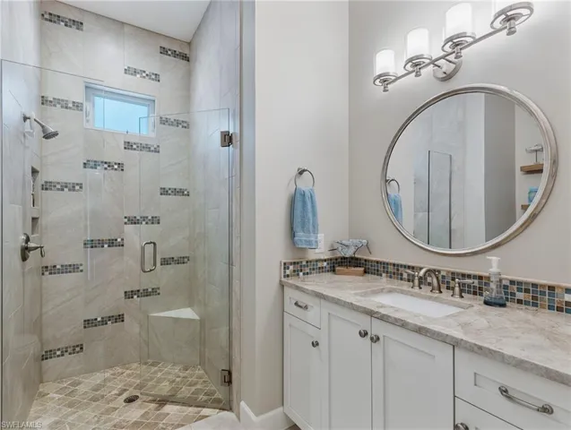 Full Bath next to BR 1 and accessible from the hallway