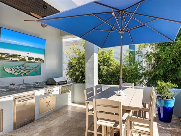 Dining space by outdoor kitchen