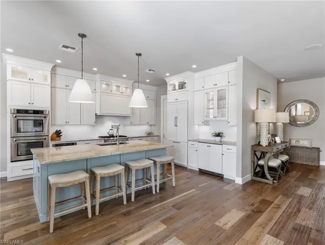 Shaker cabinets with integrated refrigerator and wine cooler