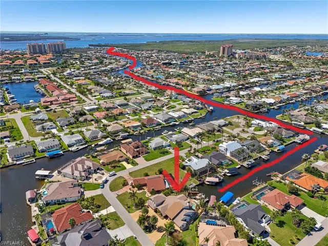 Aerial view of residential area with a nearby body of water