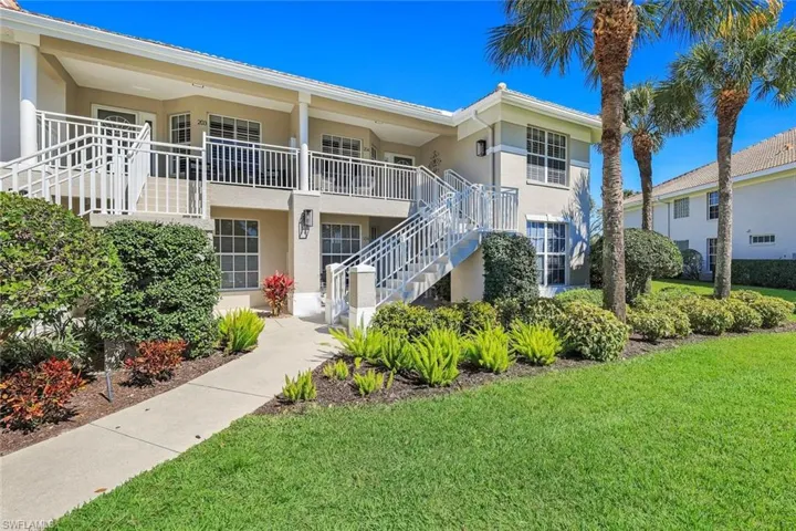 View of apartment building / complex with stairs