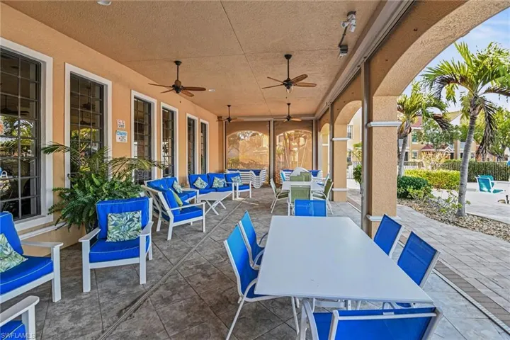 View of patio featuring outdoor lounge area and ceiling fan