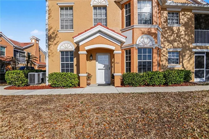 View of front of house with stucco siding