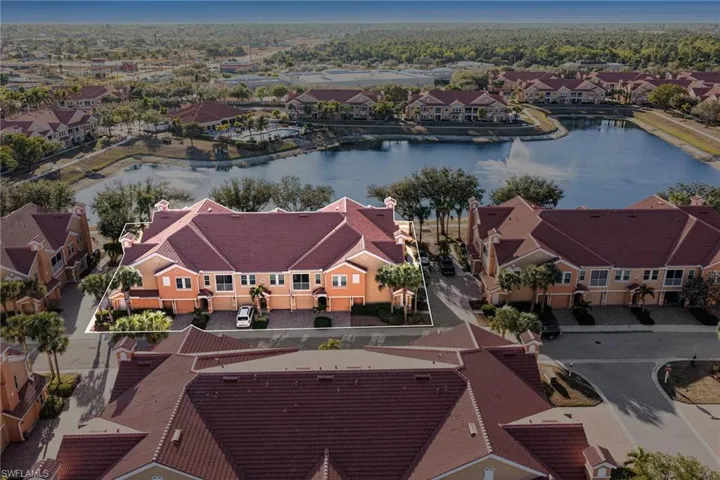 Aerial view of residential area with a large body of water