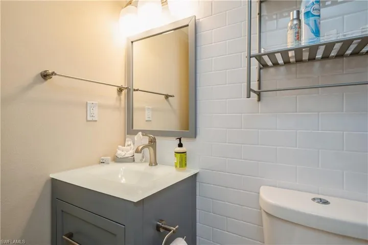 Bathroom with vanity and toilet