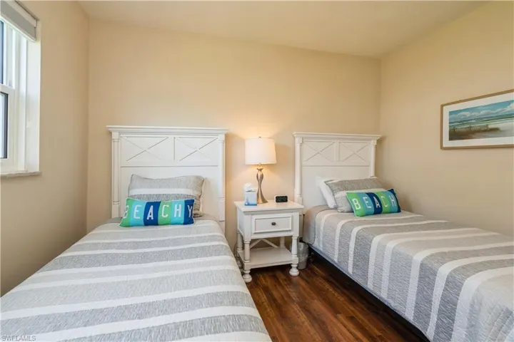 Bedroom featuring dark hardwood / wood-style flooring