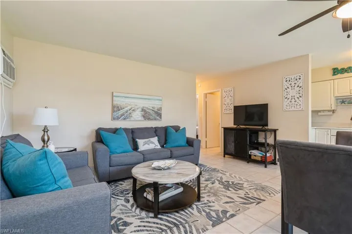 Tiled living room with ceiling fan