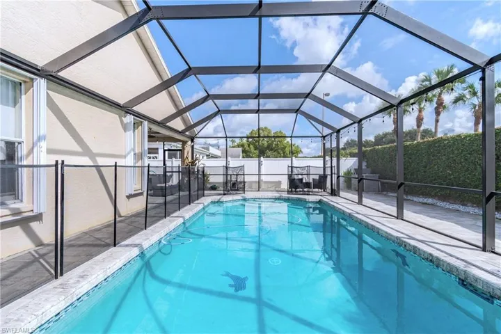 Large, heated Pool with removable safety fencing and screen enclosure.