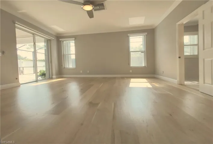 Master bedroom with newly re-finished hardwood floor