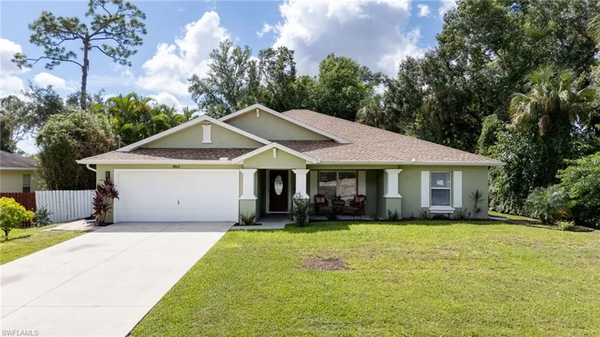 Craftsman-style house featuring driveway, stucco siding, a garage, and New roof