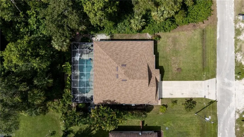 View from above of property featuring a pool area