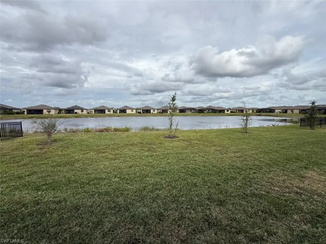 Water view featuring nearby suburban area